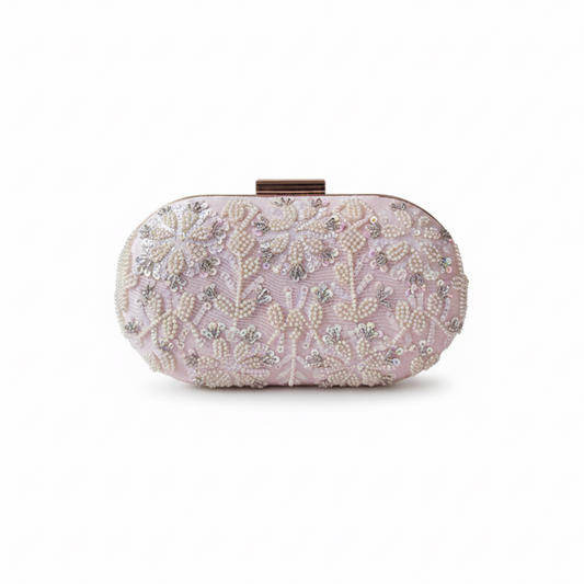 Decorative clutch bag with floral patterns on a white background
