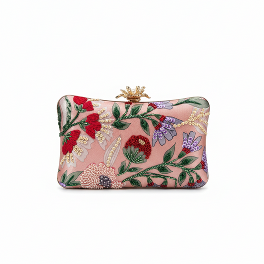 Floral embroidered clutch bag on a white background
